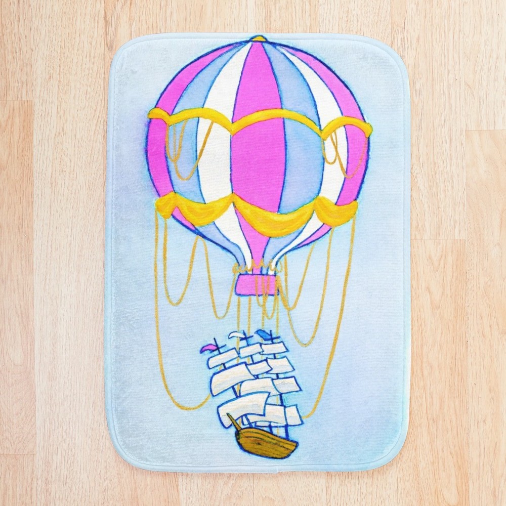 Photo of bath mat with Air Ship drawing on it