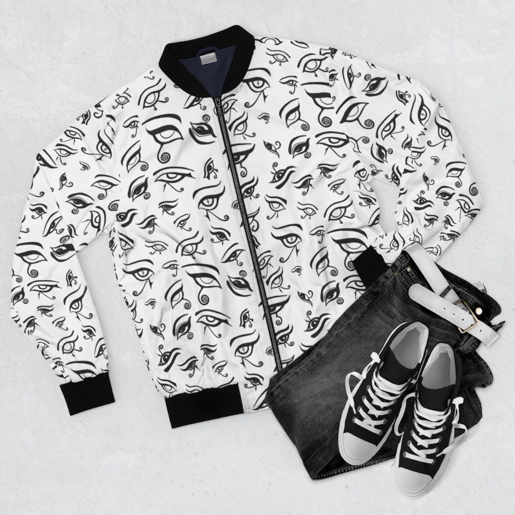 Bomber jacket with pattern on it with jeans and shoes