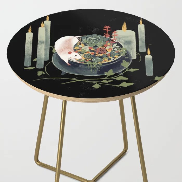 Spellbinding Halloween decor idea: A round side table with an illustration of a bowl